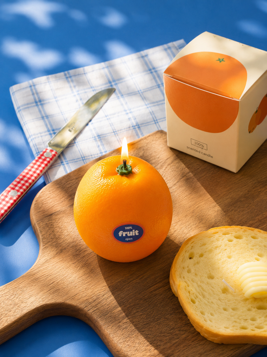 Orange scented candle