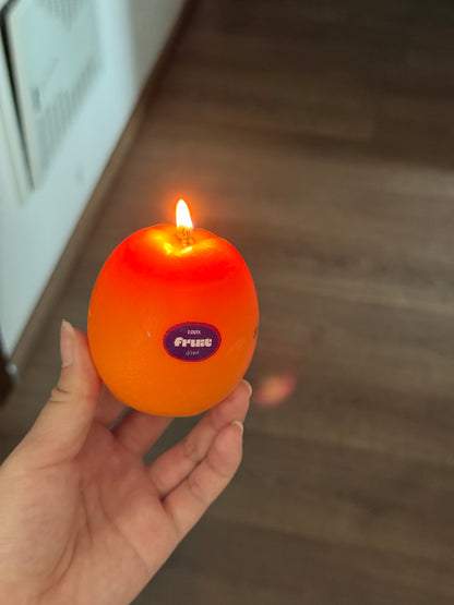Orange scented candle